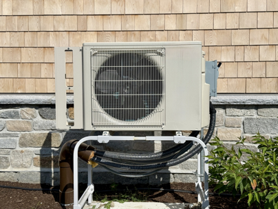 heat pump set up outside residence