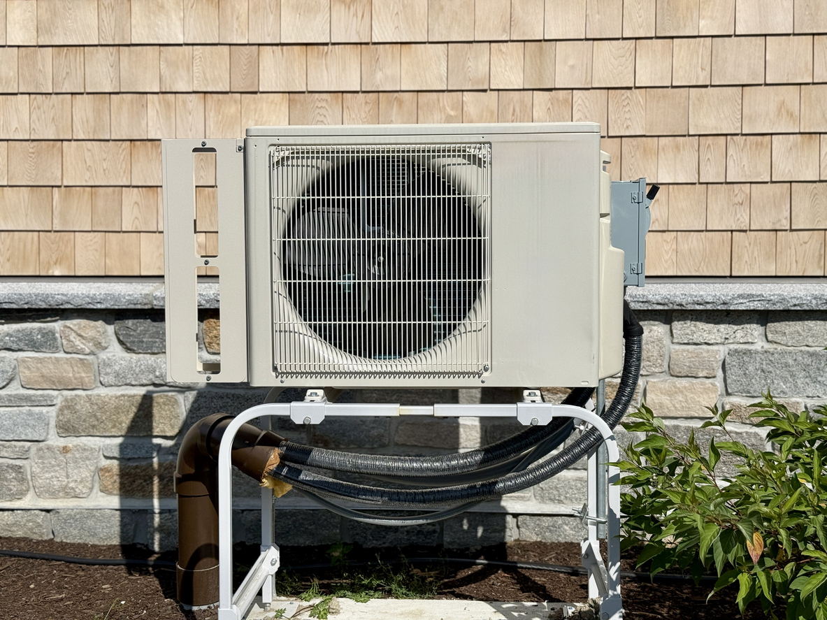 heat pump set up outside residence